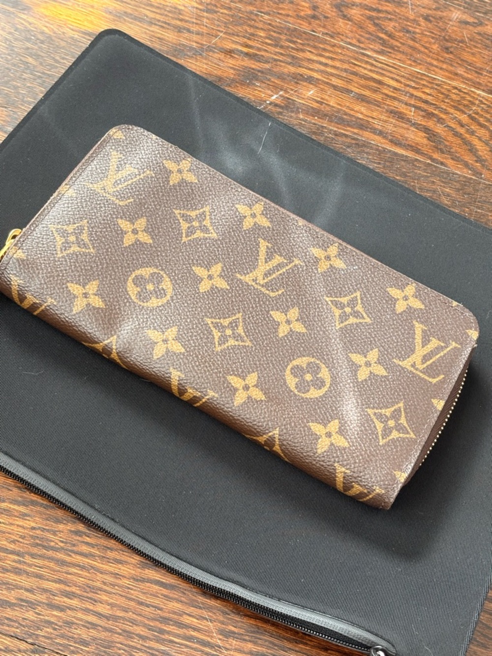 Louis Vuitton Brown Monogram Zippy Wallet with Gold Accents and Red Interior